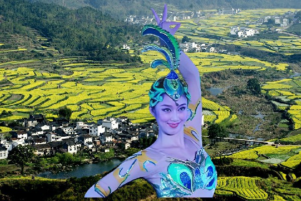 於秋文获赞为哲古镇天艺舞姿舞师，凤凰战衣